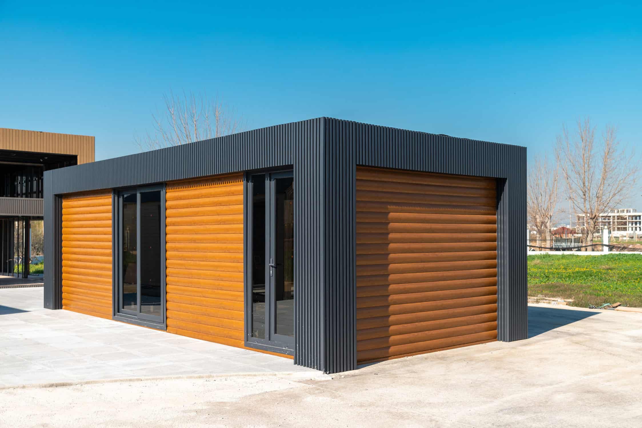 Newly built metal framed building with siding. Construction of a new tiny house. selective focus