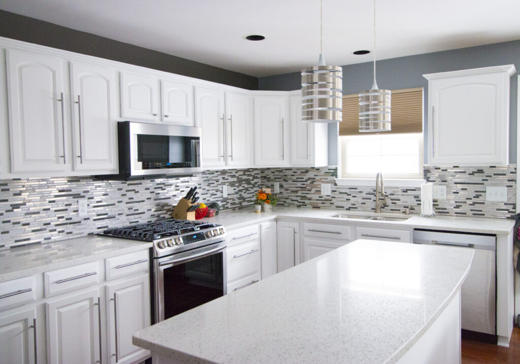 Freshly painted white kitchen cabinets — Roy & Paul